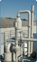 Two-stage scrubber for neutralizing chemical fumes and odors