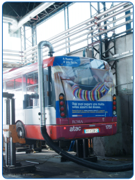 Smoke and gas extraction from a bus garage exhaust is carried out using an extraction reel connected to a central suction system.
